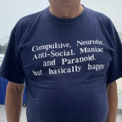 Compulsive, Neurotic, Anti-Social, Maniac and Paranoid but basically happy Cursed T-Shirt in Blue
