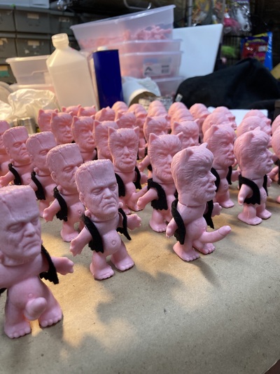 HORNY MONSTER - (UNPAINTED PINK RUBBER WITH SOLID BLACK FELT VEST)