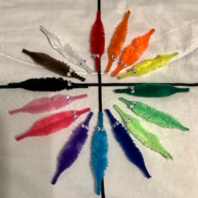 fuzzy mini worm on a string earrings!