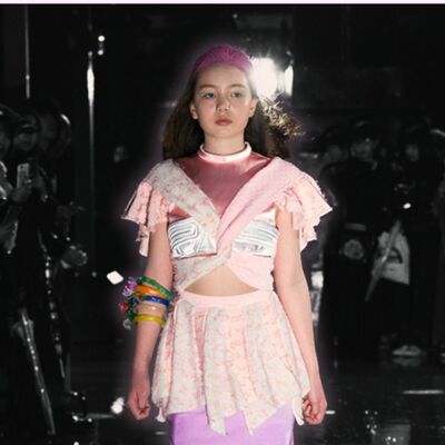 JENNY FAX Avant-Garde Criss-Cross Peplum Knit Top