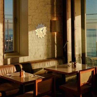 Cogwheel - unique stylish wall clock made of laser cut plywood, a piece of wall art