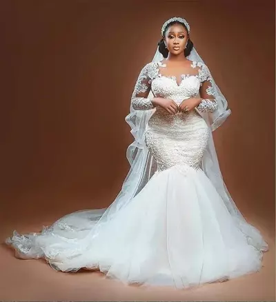 Sexy Mermaid Wedding Dresses Gorgeous Jewel Neck Tulle Long Sleeves Lace Appliques Illusion Crystal Beads Bridal Gowns