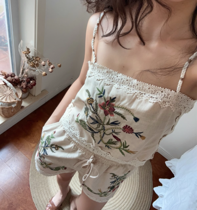 Fashionable embroidered top and casual shorts