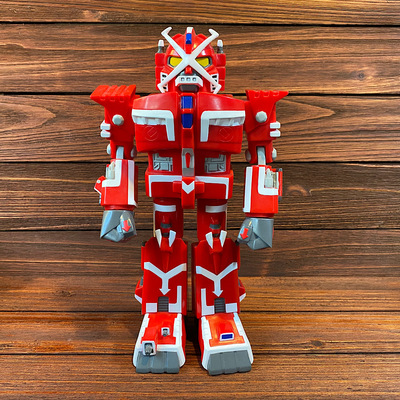 Red robot guy sofubi vinyl figure