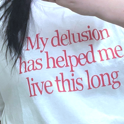 Free Shipping-MY DELUSION HAS HELPED ME LIVE THIS LONG TEE