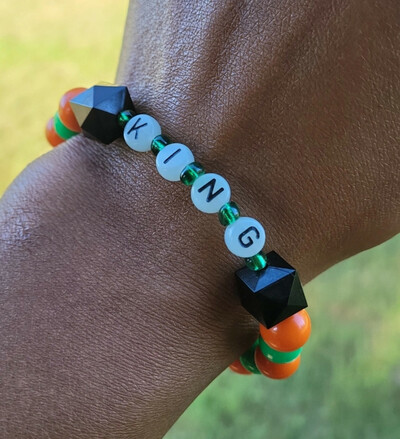 FAMU KING 👑🧡💚 GLOW IN THE DARK ALPHABET BRACELET🐍🐍🧡💚 READY-MADE🎨⏳️ By Nubian Collection Artwear 👑