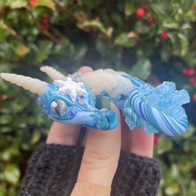 Frost the Sleepy Blue Snowflake Dragon