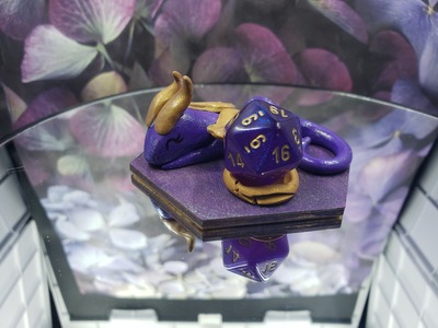 Sleepy Purple and Gold Dragon Dice Guardian