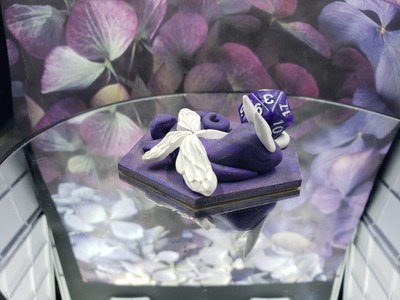 Sleepy Purple and White Dragon Dice Guardian