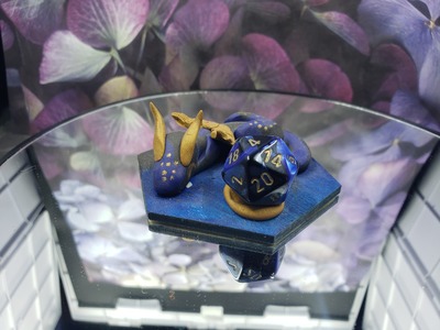 Sleepy blue and black Dice Guardian