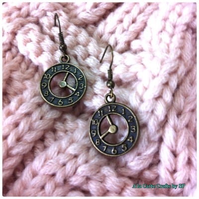 {earrings} clock