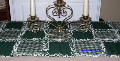 Green homespun rag quilt table runner