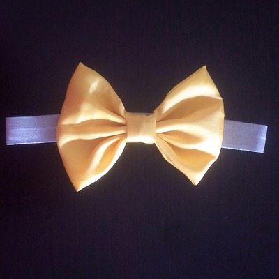 Bright Yellow Bow on Grey Elastic