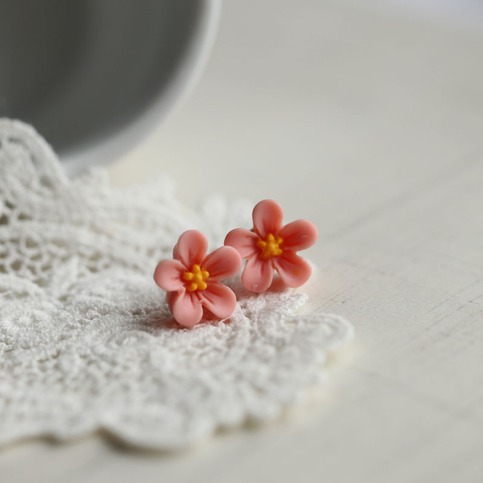 lucy. little wild flower stud earrings in romantic coral colour