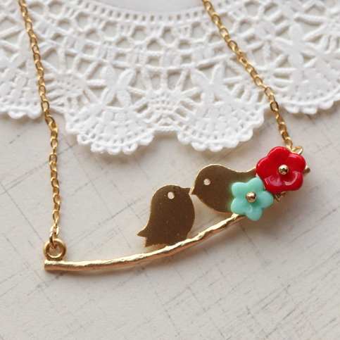 a little cute twin bird with glass flower necklace