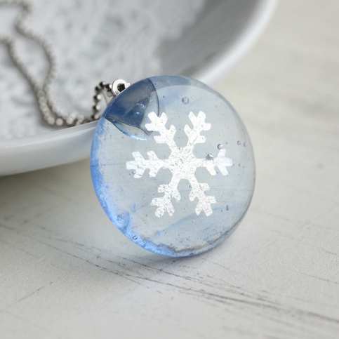 glass snow flake necklace.