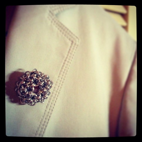 "Discus Cage" beaded Lapel Pin