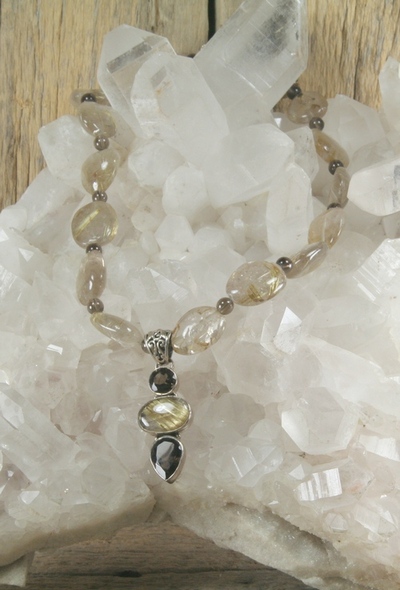 Golden Rutilated Quartz and Smokey Quartz with matching Pendant