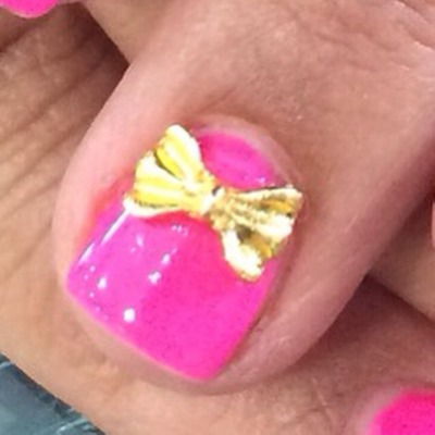 Cutie Cutie Gold Bow Charm