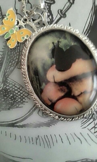 Alice in wonderland caterpillar & buttferfly necklace
