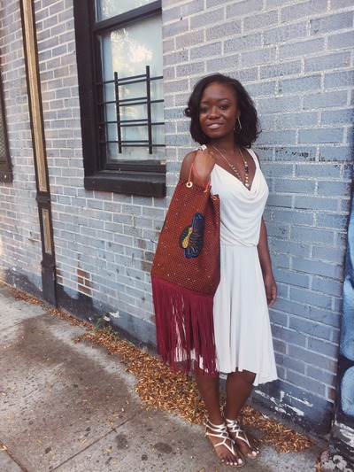 Shy Peacock ankara bucket bag with fringe