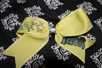 "THOR" (Your name here) CHEER BOW; 2 in Yellow Grosgrain Ribbon trimmed in White with Silver center