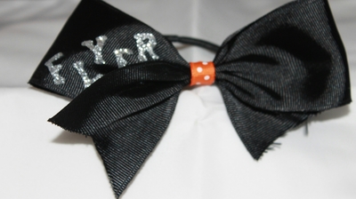 STUNT GROUP - "FLYER" 2 in Black Grosgrain Ribbon with an Orange & White Polka Dots Center; BASE in Silver Bling Letters Cheer Bow