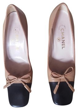 Chanel tan and black pumps