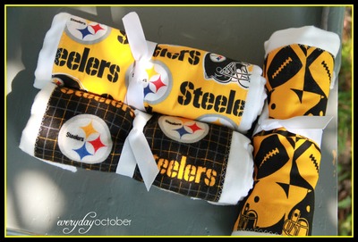 Black and gold burp cloths