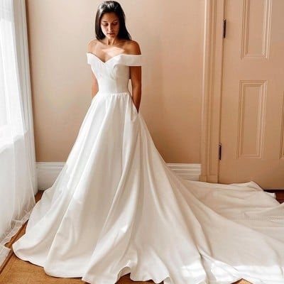 Beautiful off the shoulder white satin wedding dresses with pockets - Thumbnail 1