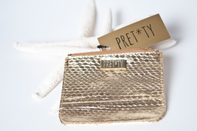 Signature PRET*TY gold-dyed snakeskin bag