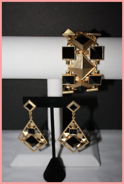 Gold chandelier earrings and matching chunky bracelet