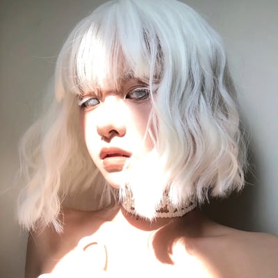 White short curly wigs