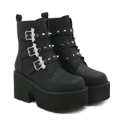 Metal bat buckles platform booties with rivet detail