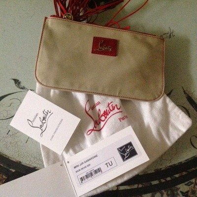 100% authentic christian louboutin wrislet