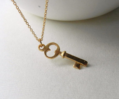 Tiny  gold key necklace 