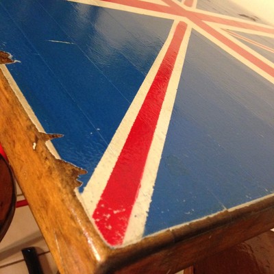 Distressed british pub table with three stools