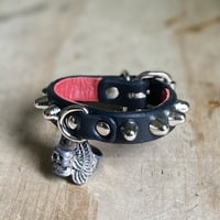 1-row short british studs lil’ d-ring wristband - Thumbnail 1