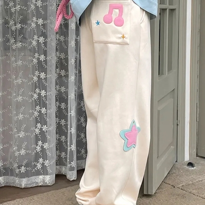 Beige star wide leg trousers 