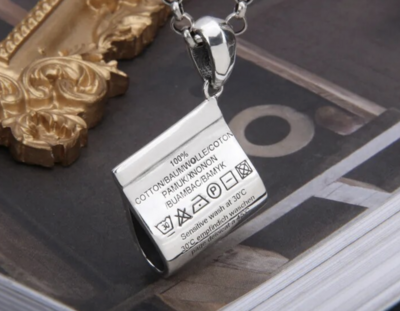 Fabric Care tag Silver Necklace