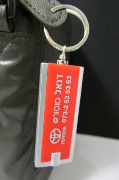 New red silver metal key chain fashion + flash light Middle East edition Toyota
