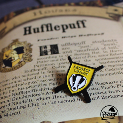 Limited edition "protect the puffs" enamel campaign pin to benefit the badger trust