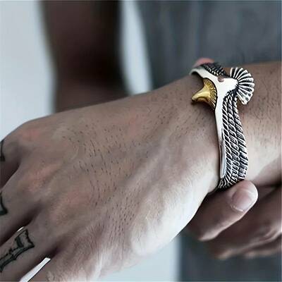Vintage open bracelet with eagle and feather motif for men and women