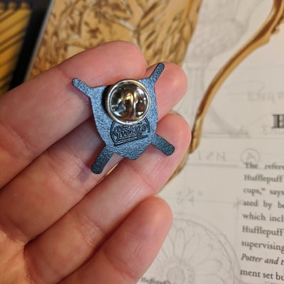 Limited edition "protect the puffs" enamel campaign pin to benefit the badger trust 