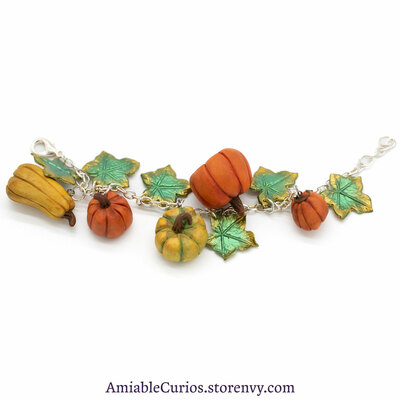 Pumpkin charm bracelet, polymer clay, autumn, fall, leaf, yellow, orange, green. unique, handmade, sparkle, chain, ooak