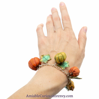 Pumpkin charm bracelet, polymer clay, autumn, fall, leaf, yellow, orange, green. unique, handmade, sparkle, chain, ooak