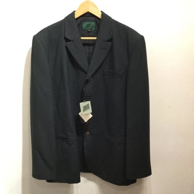 Junior gaultier black four buttons jacket with a tag