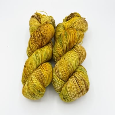 Banana bread hand dyed fingering weight sock yarn