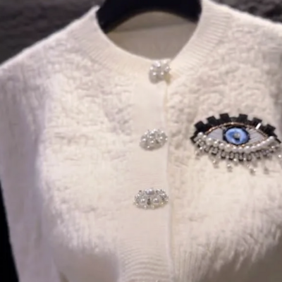 Evil eye cardigan knitted black or ivory