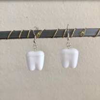 teeth container earrings!